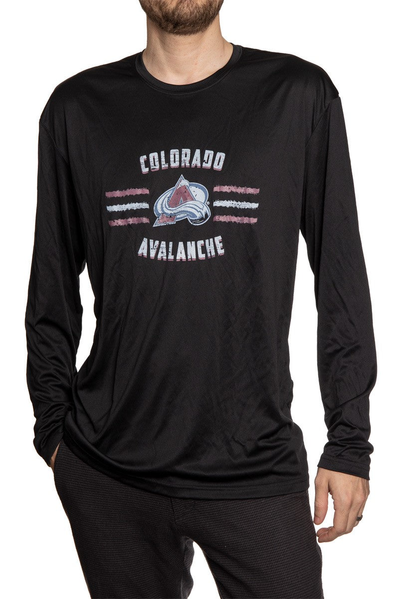 Men's Officially Licensed NHL Distressed Lines Long Sleeve Performance Rashguard Wicking Shirt- Colorado Avalanche Full Length Photo Man Wearing Shirt With Hand In Pocket
