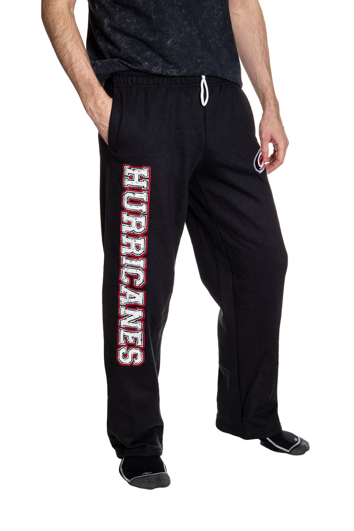 Carolina Hurricanes Premium Fleece Sweatpants Side View of Hurricanes Print.