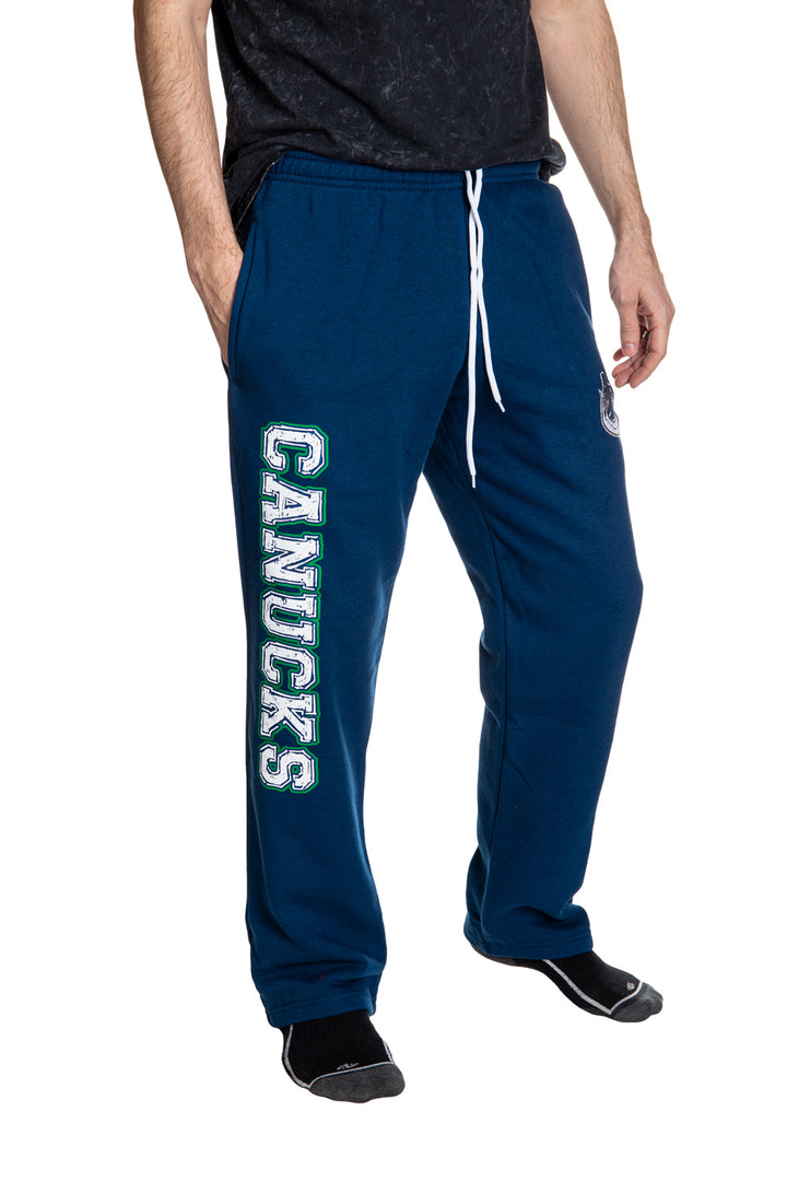 Vancouver Canucks Premium Fleece Sweatpants Side View of Canucks Print.