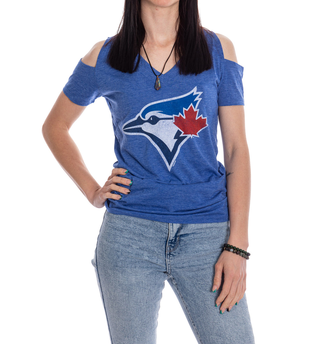 Cheer on the Blue Jays this summer while looking stylish in this cute 'cold shoulder' T-Shirt! Made from polyester/cotton blend fabric, this lightweight shirt is super comfortable and will let you show your true Blue Jays Fandom! 