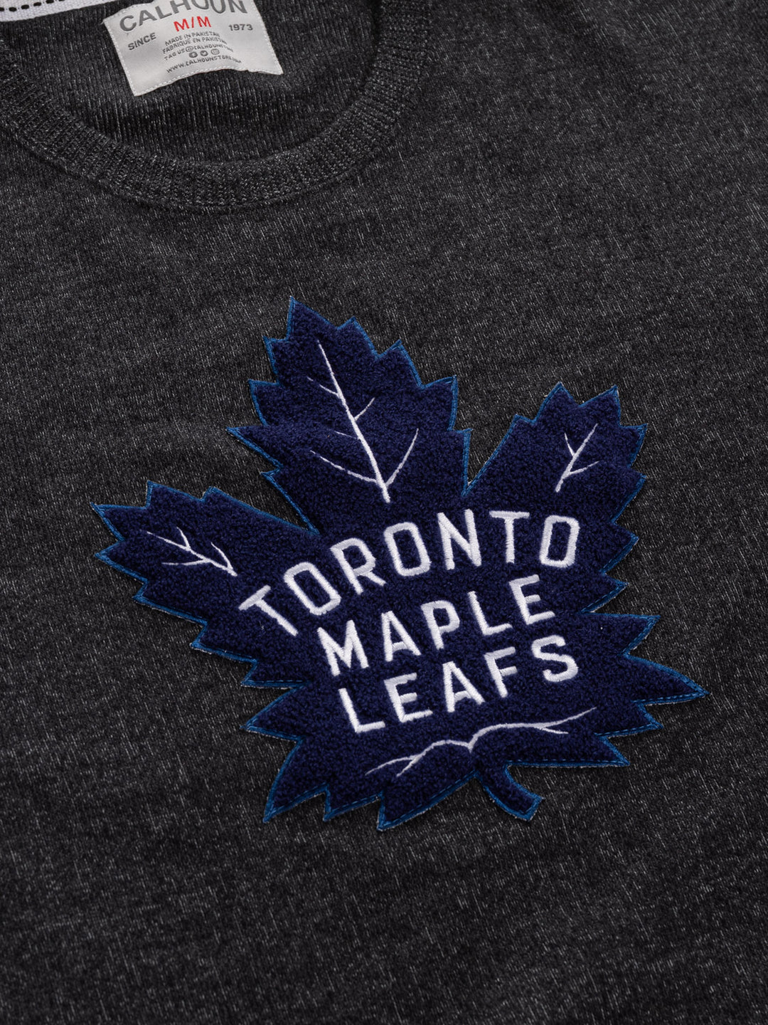 Toronto Maple Leafs blackout NHL Unisex Cabin Crew Neck Sweater with Chenille logo