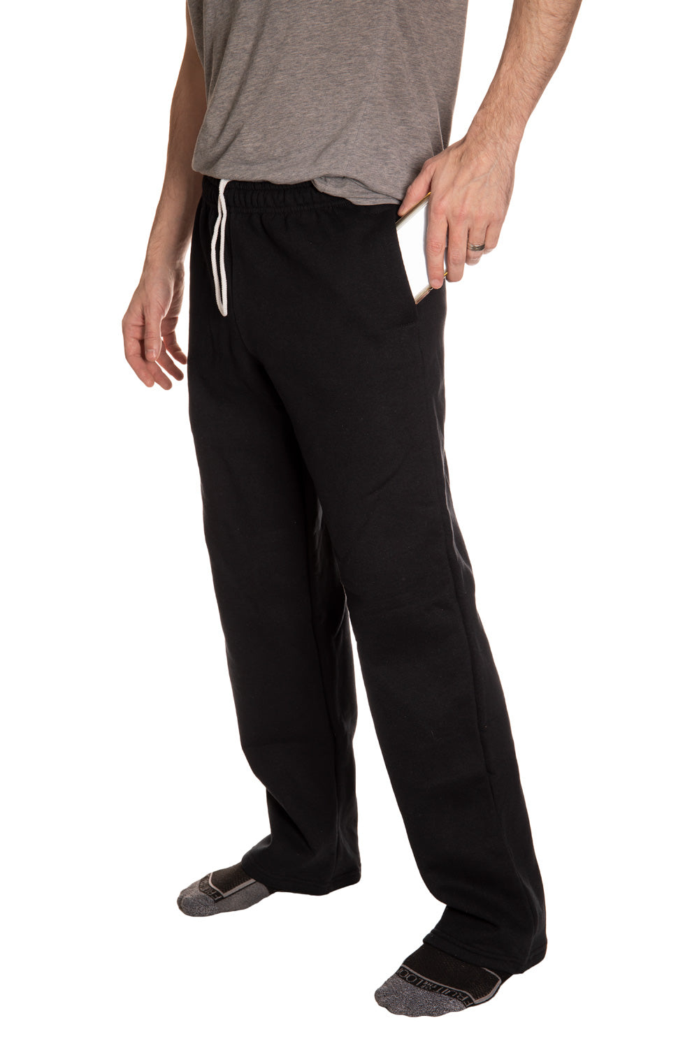 Anaheim Ducks Embroidered Logo Sweatpants Side View, Phone in Pocket.