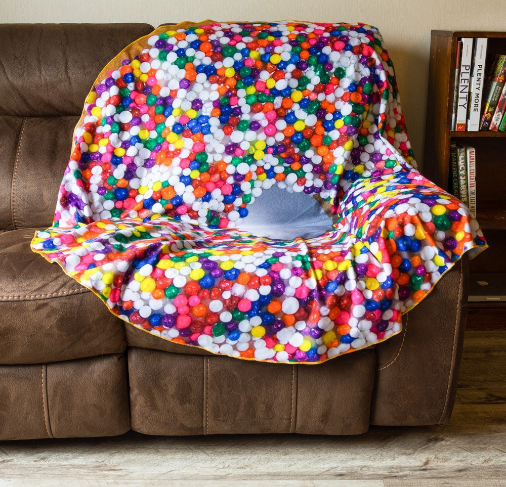 Realistic Donut Blanket Draped Over Couch