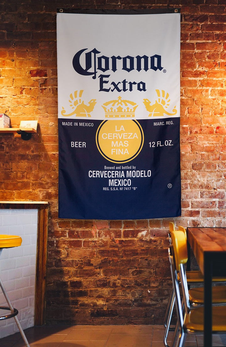 Corona Indoor Wall Banner- Corona Label (30" by 50") Banner Hanging ON Brick Wall 