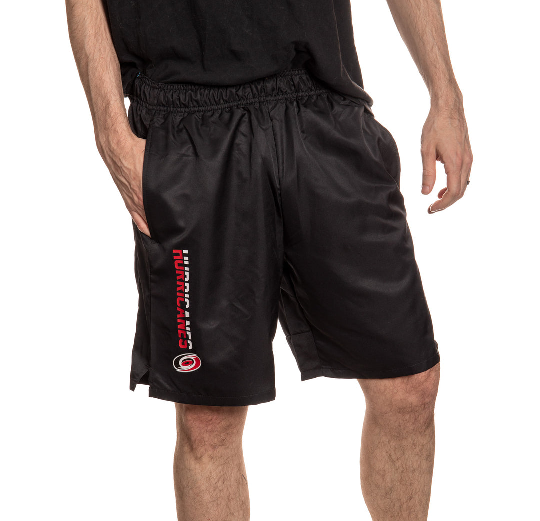 Carolina Hurricanes Quick Dry Shorts Front. Black Short, Red and White Feature