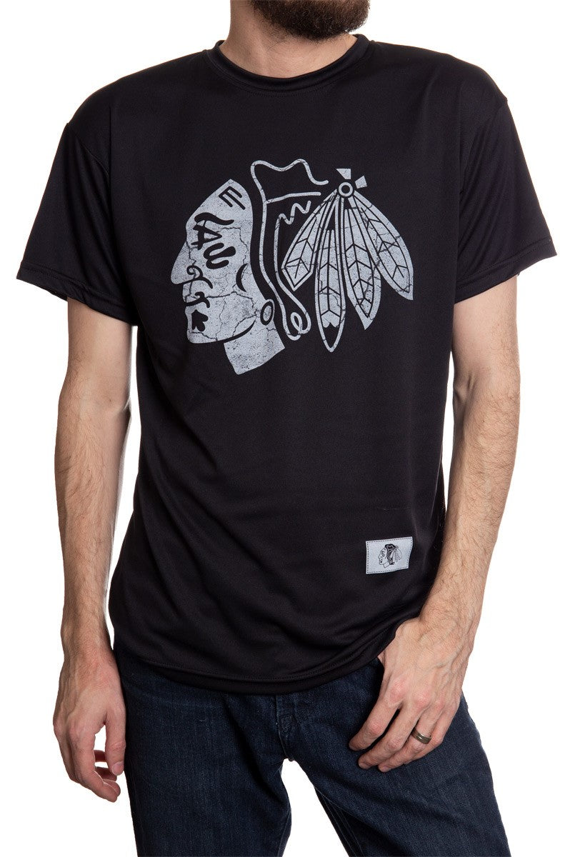 Chicago Blackhawks Short Sleeve Rashguard With Distressed Logo. Front View, Black Shirt, White Print.