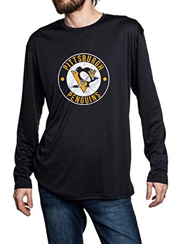 Pittsburgh Penguins loose fit long sleeve rashguard in black, front view. Distressed logo in middle of the chest.
