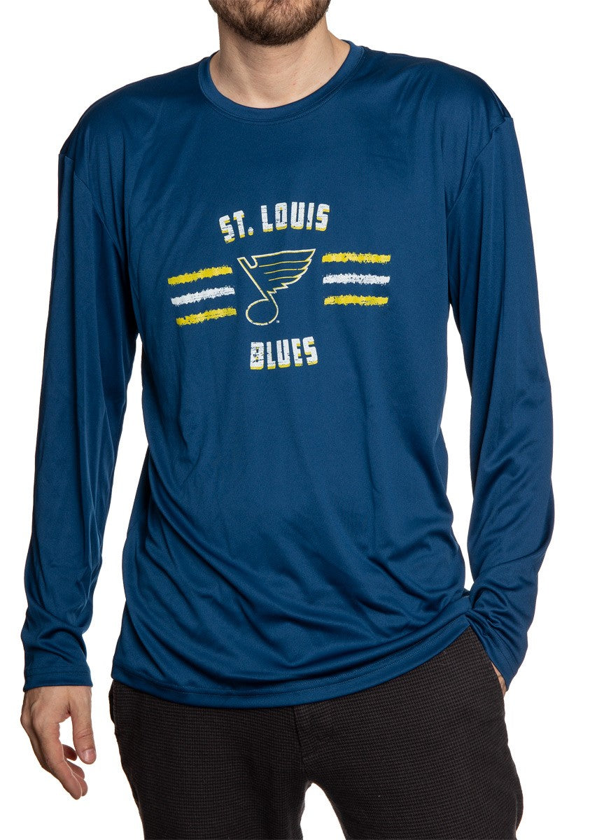 Men's Officially Licensed NHL Distressed Lines Long Sleeve Performance Rashguard Wicking Shirt- St. Louis Blues Full Length Photo Of Man Wearing Shirt WIth Hand In Pocket 