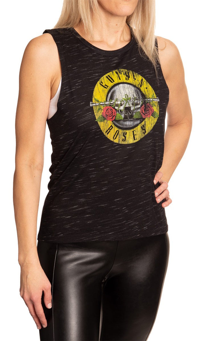 Ladies Guns N' Roses Circle Logo Crew Neck Space Dyed Cotton Sleeveless T-Shirt Full Size View Woman Wearing Shirt and Leather Pants