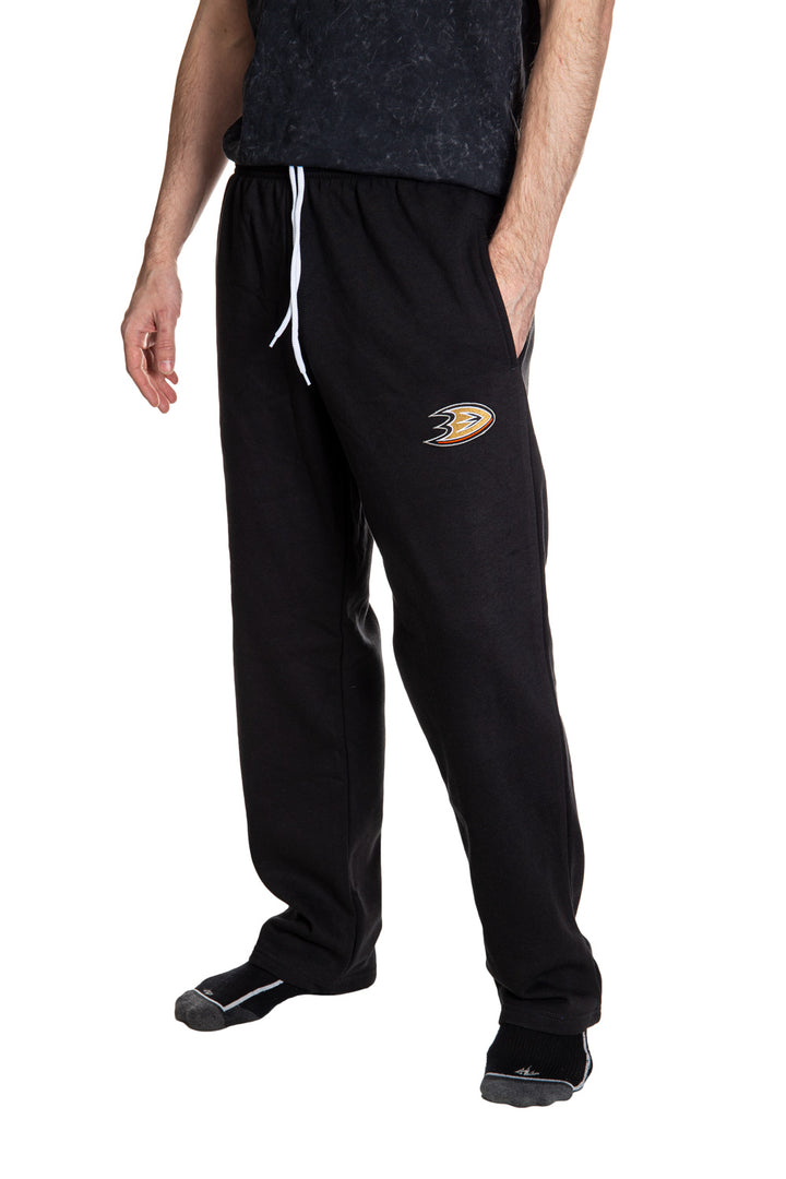 Anaheim Ducks Premium Fleece Sweatpants Side View of Embroidered Logo. 