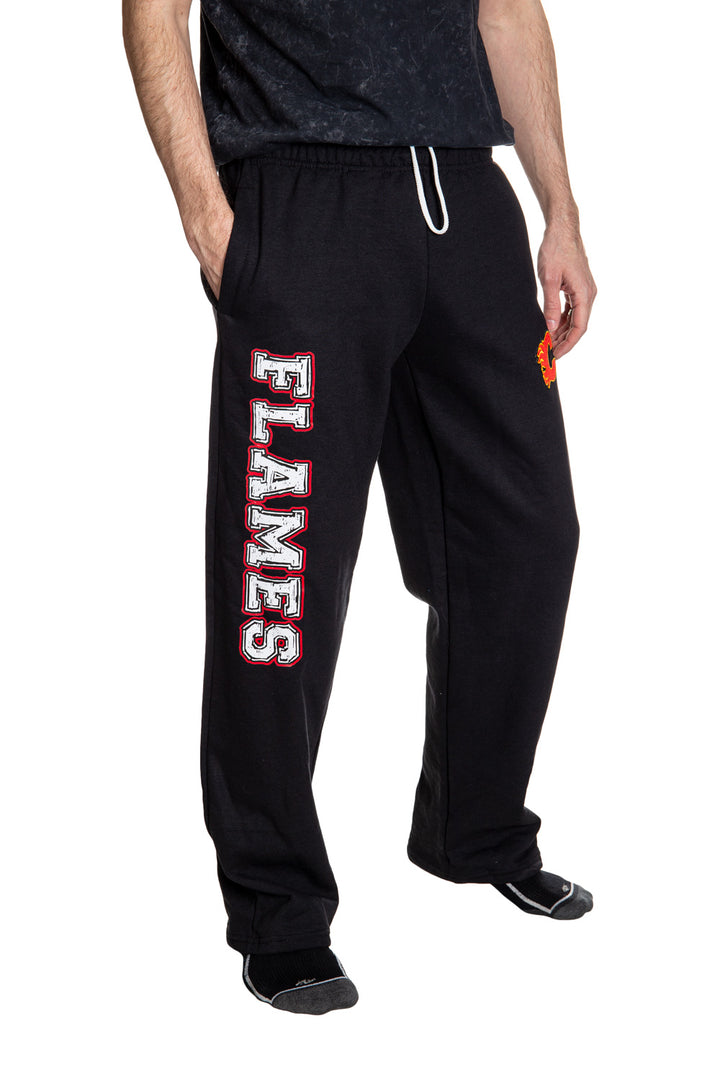 Calgary Flames Premium Fleece Sweatpants Side View Of Flames Written Down Leg.