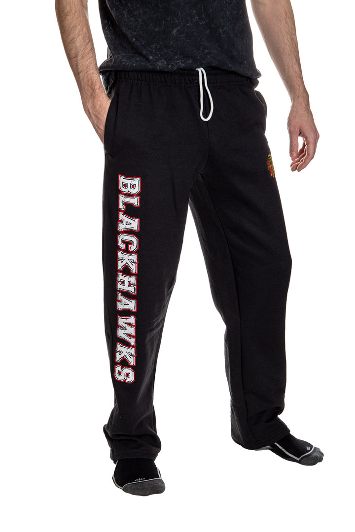Chicago Blackhawks Premium Fleece Sweatpants Side View Of Blackhawks Written Down Leg. 