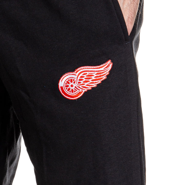 Detroit Red Wings Premium Fleece Sweatpants Close Up of Embroidered Logo.