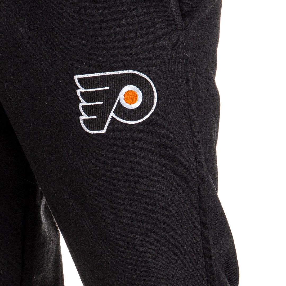 Philadelphia Flyers Premium Fleece Sweatpants Close Up of Embroidered Logo.