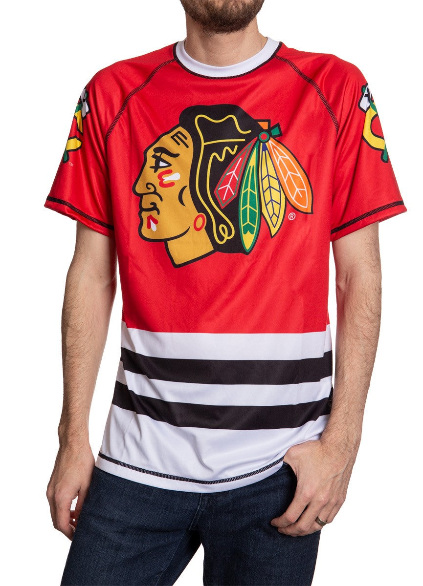 Chicago Blackhawks Short Sleeve Game Day Jersey. Front View, Red and White Design With Black Horizontal Stripes Below. Blackhawks Logo In Middle Of CHest.