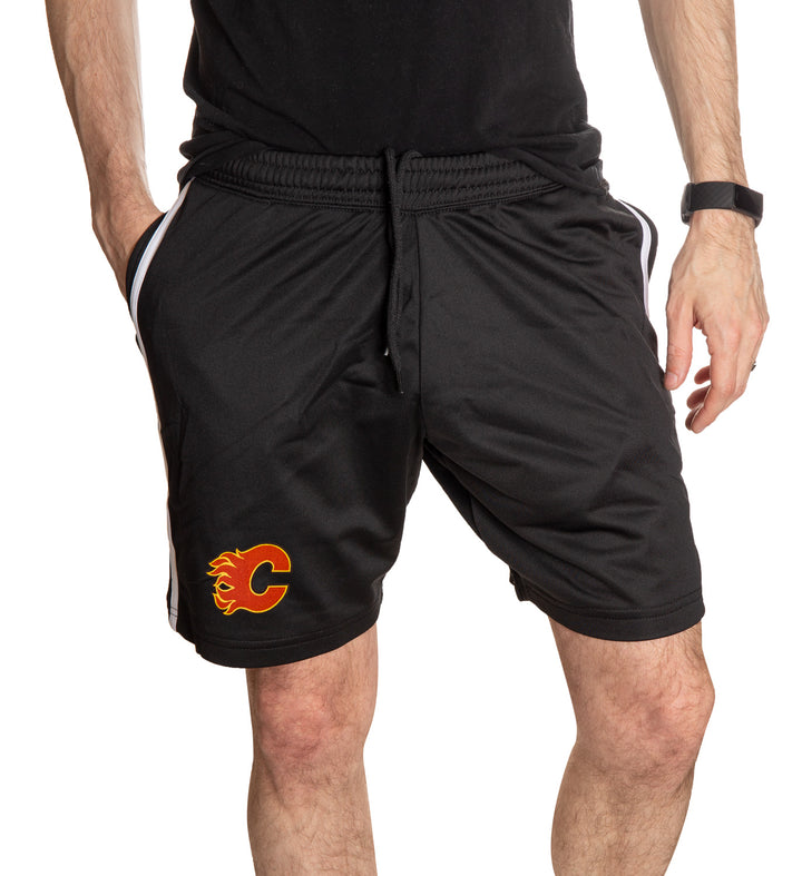 Calgary Flames Two-Stripe Shorts for Men. Front View, Black Shorts.